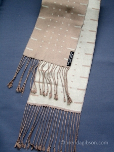 Silk scarf in satin blocks, pale blue/taupe. £150.00