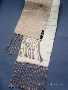 Silk scarf in satin blocks, pale blue/taupe. £150.00