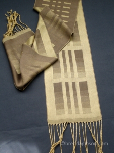 Silk scarf in shaded satin, gold/taupe. £150.00