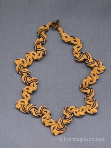 Ply-split starfish, gold, standard size. SOLD